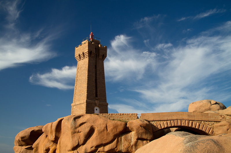 city, lighthouse, building, coast, architecture, government, no people, travel, cliff, blue, day, nature, cloud - sky, sky, patriotism, low angle view