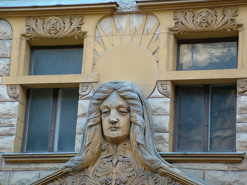 human representation, building, male likeness, old town, the past, history, window, art nouveau, built structure, sculpture, statue, bas relief, representation