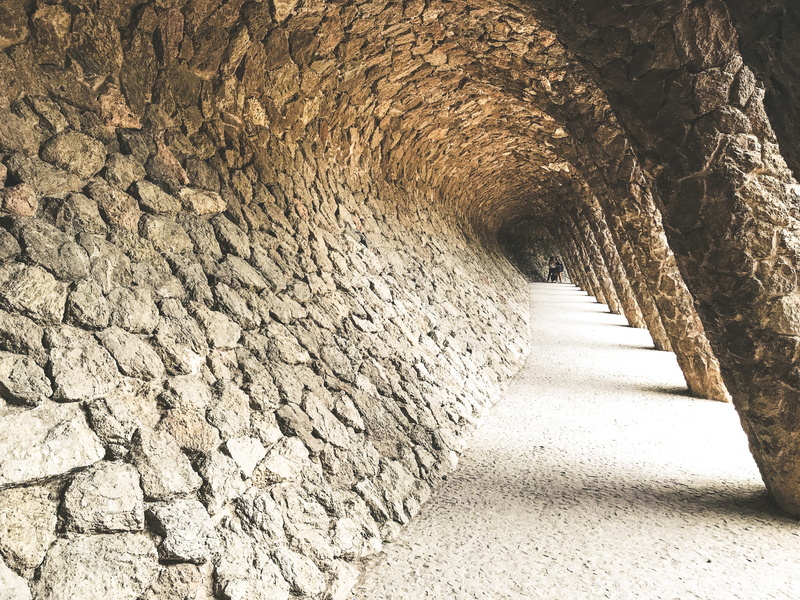 stone work, vanishing point, rock, built structure, wall - building feature, lines, ancient civilization, the way forward, direction, park guell, architecture