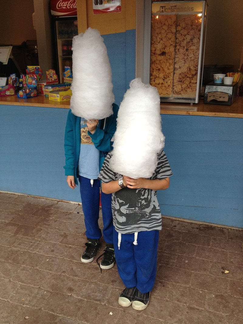 sugar, girls, women, females, leisure activity, standing, casual clothing, lifestyles, cotton candy, bonding, two, childhood, white, toddler, men, adult