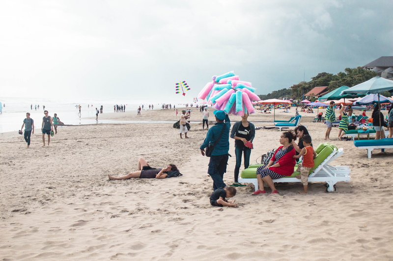 group of people, women, adult, men, holiday, large group of people, real people, vacation, vacations, trip, leisure activity, outdoors, sun, umbrella, indonesia
