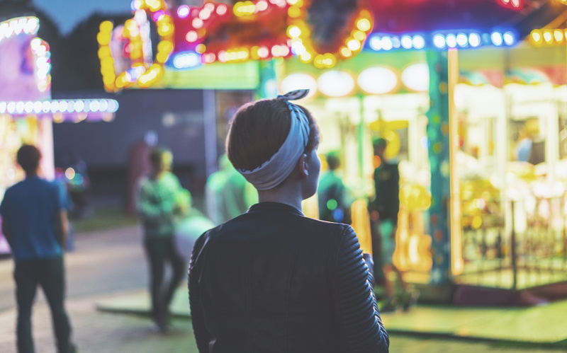 group of people, women, woman, focus on foreground, architecture, adult, city, arts culture and entertainment, blur, leisure activity, amusement park, lights