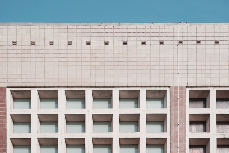 blue, concrete, modern, day, architecture, roof, hotel, low angle view, apartment, built structure, building, structure, establishment, windows, swimming pool