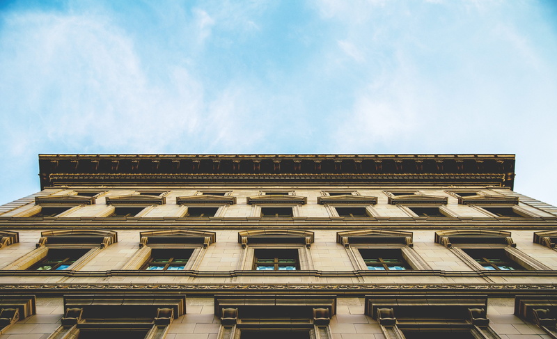 architectural feature, daytime, nature, built structure, hotel, no people, side by side, windows, classical style, building exterior, blue, condominium