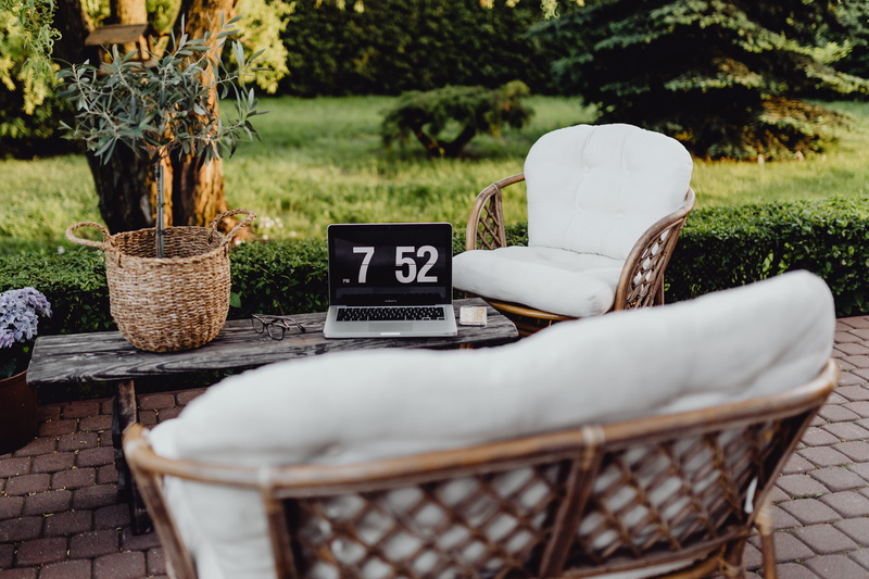 workspace, day, armchair, outdoors, table, terrace, chair, study, outdoor, absence, work, summer, laptop, office, plant, container, selective focus, garden