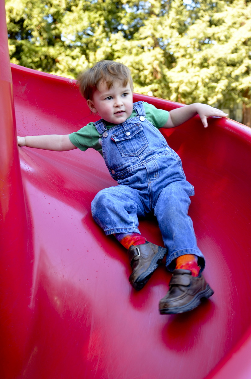 playground, childhood, park, Slide, full length, one person, front view, cute, outdoor play equipment, red, lifestyles, outdoors, looking away, 4K, child