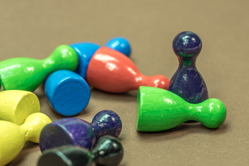 table, art and craft, marbles, cone, large group of objects, close-up, focus on foreground, toy, choice, no people, green color, solid, playsets, play stone