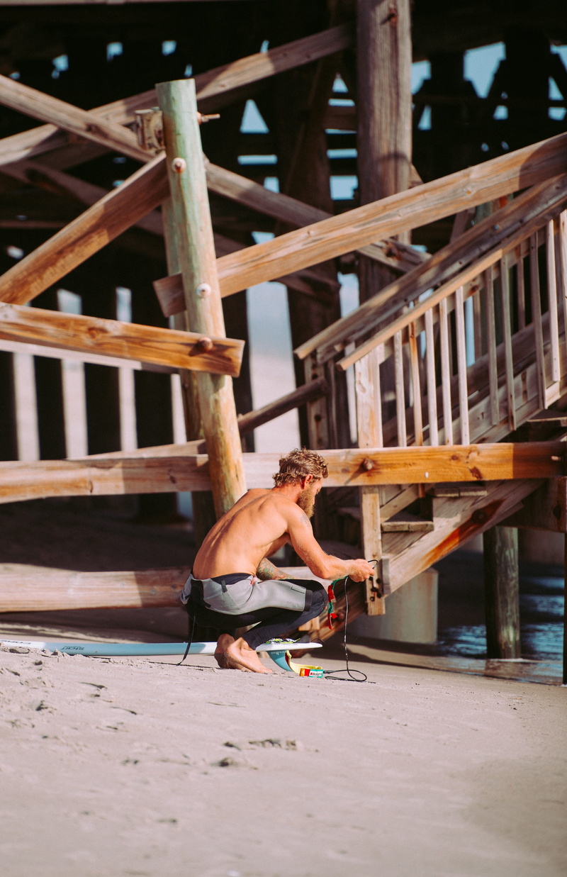 men, real people, adult, jungle gym, people, man, guy, wood, land, architecture, leisure activity, cottage, bridge, shirtless, built structure, effort