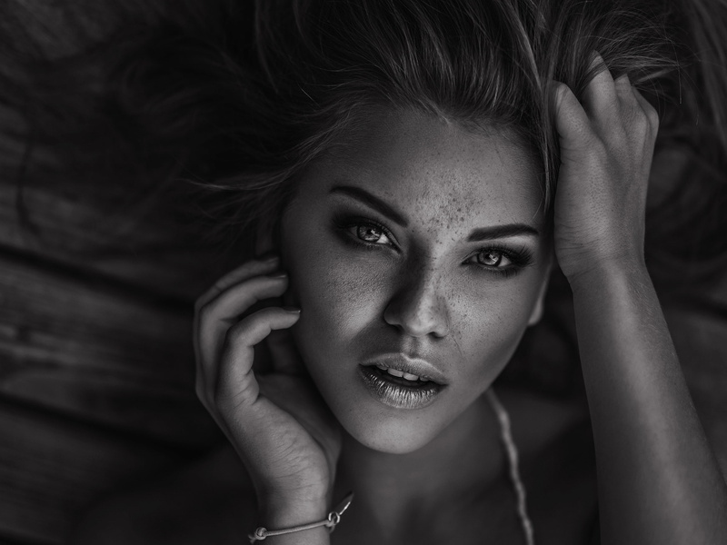 real people, women, face, adult, freckles, close-up, one person, indoors, human hand, monochrome, young women, contemplation, hand, portrait, beauty, focus on foreground
