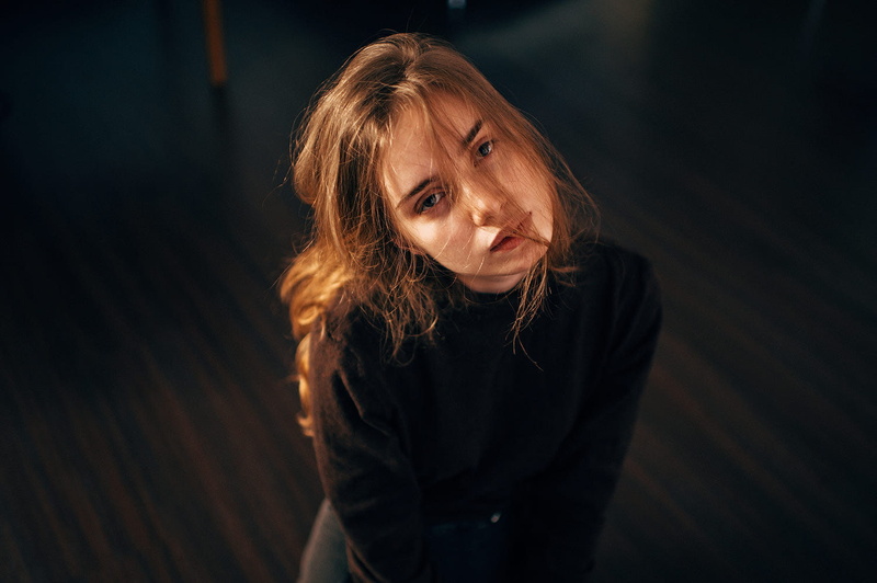 model, depth of field, brunette, women, front view, portrait, black background, beautiful woman, contemplation, sweater, indoors, child, childhood, face