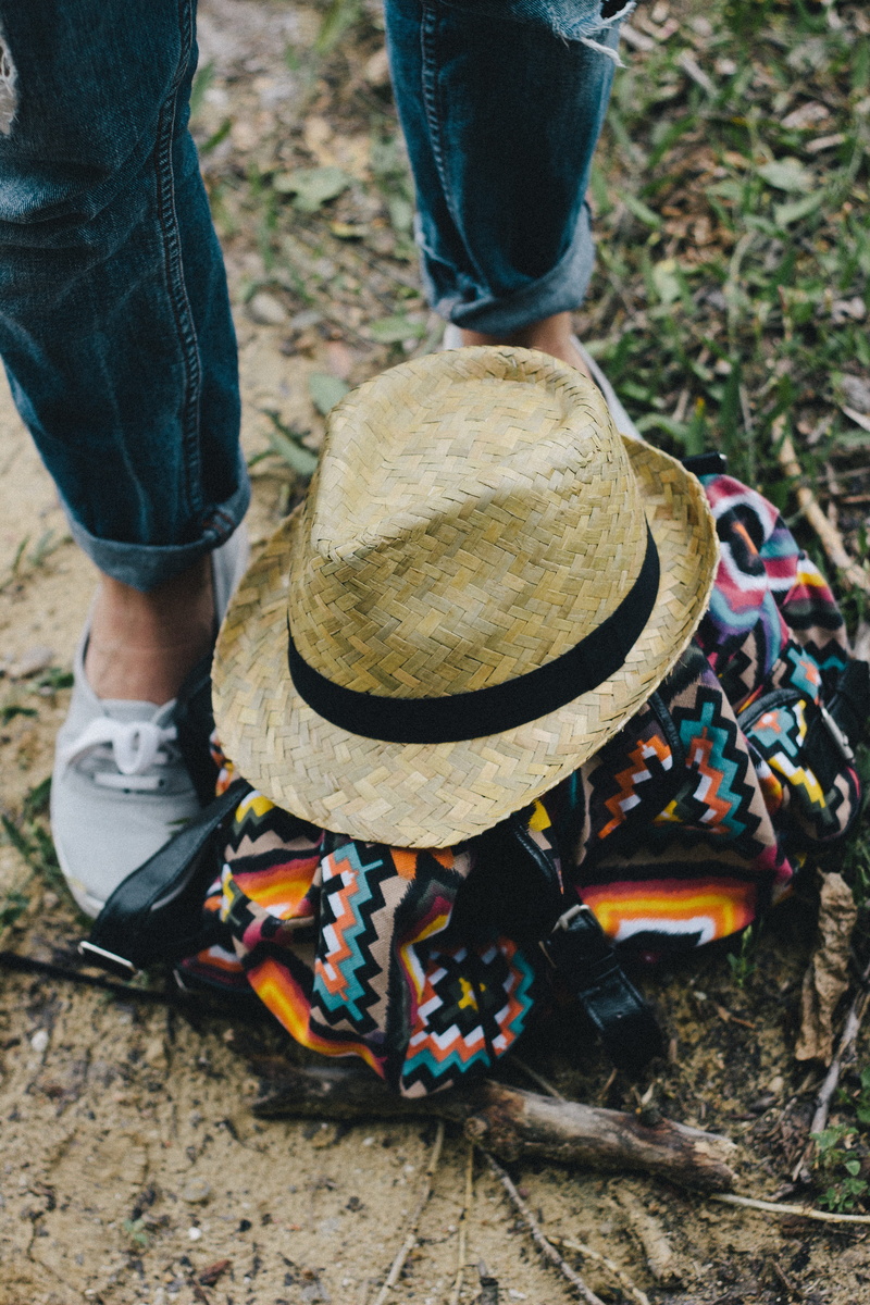 outdoors, hat, woman, casual clothing, shoe, real people, hipster, sitting, adult, cowboy, human leg, caucasian, beauty, nature, clothing, girl, rear view