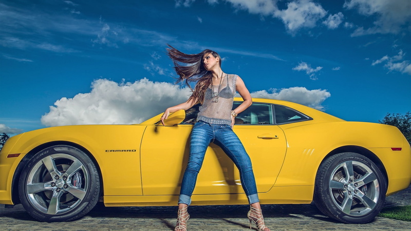 yellow, high heels, see-through blouse, land vehicle, human arm, mode of transportation, outdoors, long hair, car, casual clothing, adult, Chevrolet Camaro