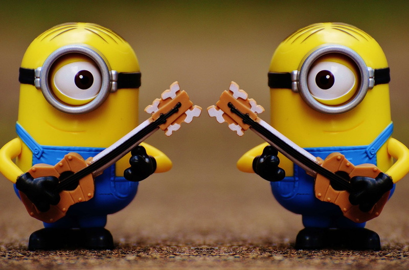 playing, yellow, human representation, macro, 2K, representation, wheel, sport, challenge, two objects, day, musical equipment, technology, miniature