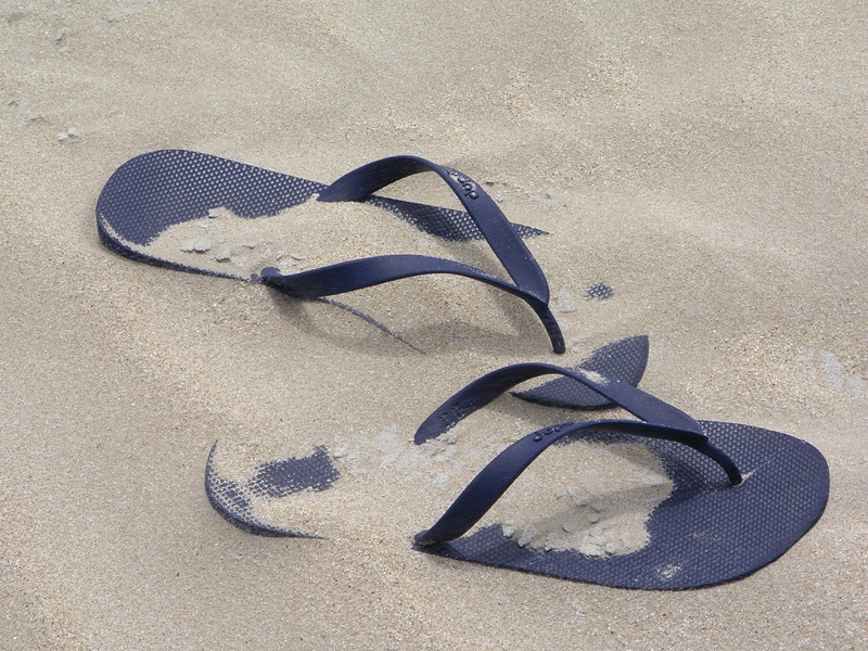leisure, high angle view, shoe, compatibility, close-up, personal accessory, slipper, flip-flops, beach, outdoors, summer, sport, vacation, black, day