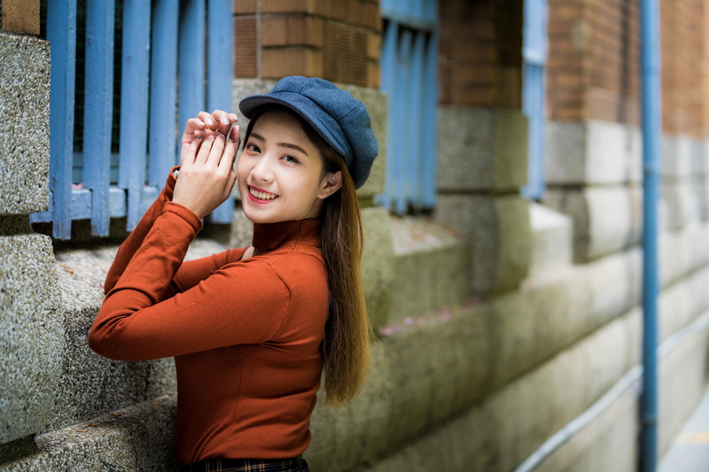 looking at viewer, wall, Asian, model, 4K, women, leaning, long shirt, long hair, brunette, berets, bars, pipe