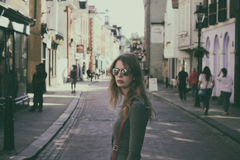 long hair, town, young women, person, people, one person, beauty, gray, young adult, long, focus on foreground, pavement, urban, shopping, built structure