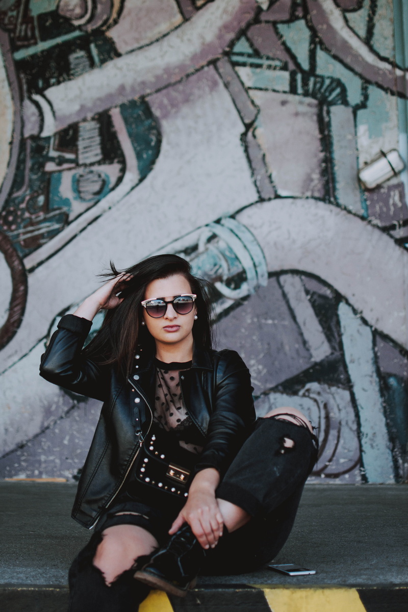 woman, daylight, sleeve, one person, real people, person, pose, posing, architecture, black leather jacket, colors, glasses, portrait, black, daytime, looking at camera