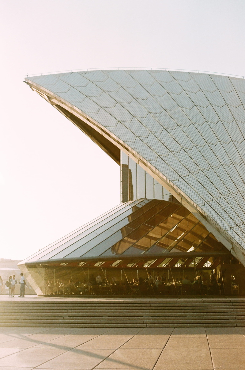 modern, travel, glass windows, low angle view, roof, outdoors, architecture, facade, clear sky, building exterior, architectural design, perspective, sydney opera house
