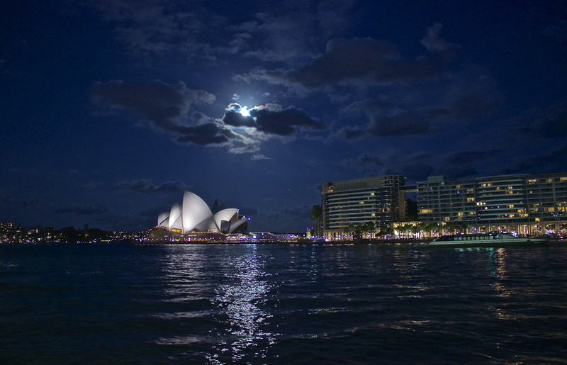 city, transportation, sea, architecture, cityscape, illuminated, skyscraper, outdoors, sailboat, night, building, passenger craft, sydney Opera House, office building exterior