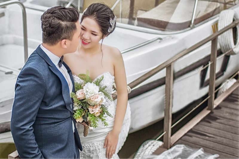 fashion, daytime, Bride and Groom, contemporary, groom, standing, boat, kissing, wedding dress, positive emotion, wife, newlywed, dress, young women, engagement