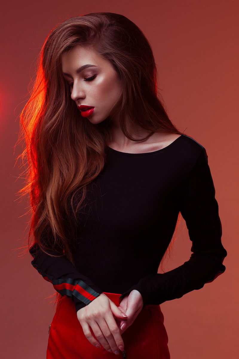 beautiful people, human face, colored background, dyed red hair, beauty, waist up, long hair, fashion, red skirt, portrait, hair, hairstyle, young adult