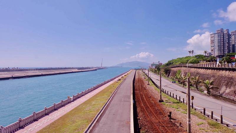 transportation, railroad track, railing, track, building exterior, travel, no people, rail transportation, hualien port, sea, travel destinations, taiwan