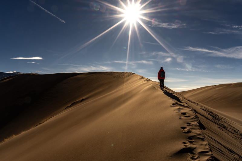 sunlight, sky, man, sunbeam, national park, leisure activity, alone, sun, great sand dunes national park, arid climate, footprint, climate, sand dune, land