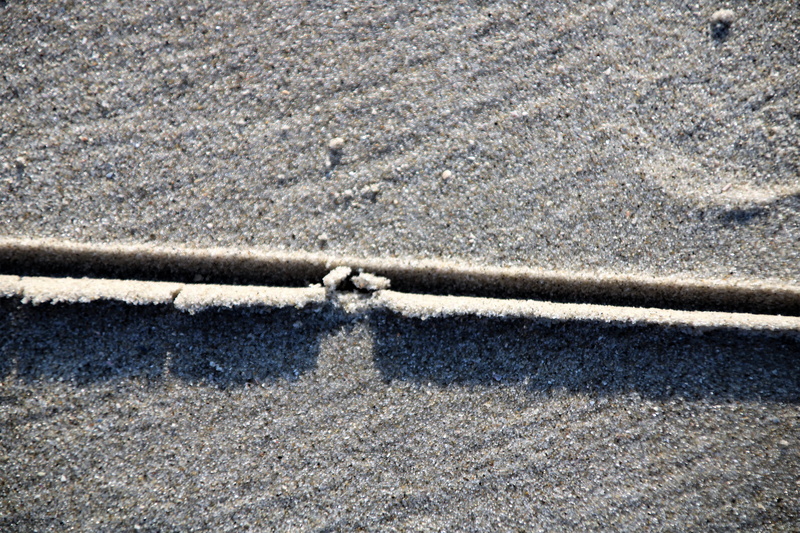 transportation, 5K, asphalt, sand, pattern, outdoors, beach, high angle view, gray, backgrounds, sunlight, pollution, stick, dirt road, gravel, strength