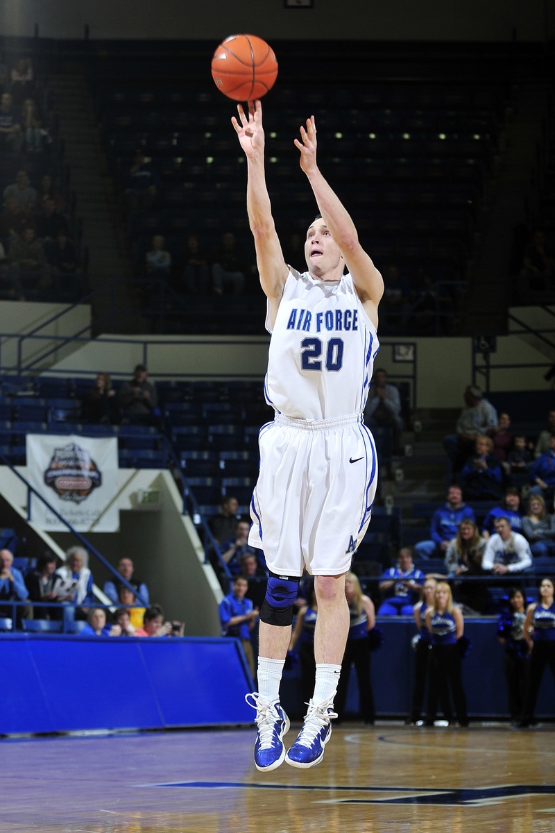 basketball uniform, fit, lifestyles, college, basketball - sport, indoors, jumping, competition, court, playing, active, shot, arms raised, sportsman, game