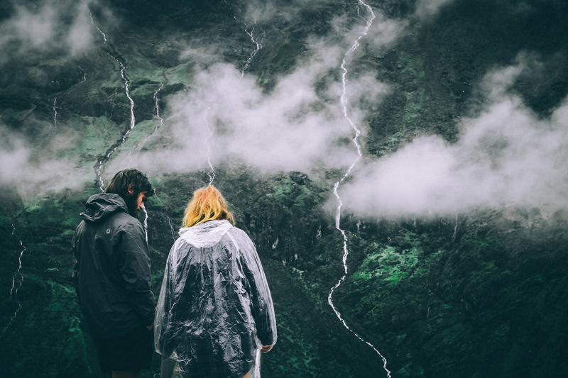 real people, man, day, rain, people, windbreaker, peak, togetherness, couple, love, land, fog, nature, hooded shirt, beauty in nature, women, lifestyles