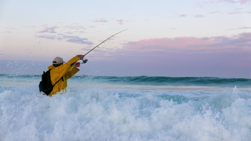 sport, beauty in nature, motion, sky, sea, lifestyles, brittany, windbreaker, fisherman, fishing, activity, nature, orange, hobbies, outdoors, water, rod