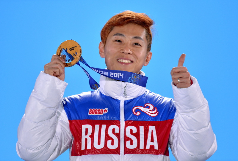 sign, smiling, Viktor Ahn, young men, short track, cheerful, males, printed, people, sky, front view, waist up, 2K, white Background, studio Shot, gesturing