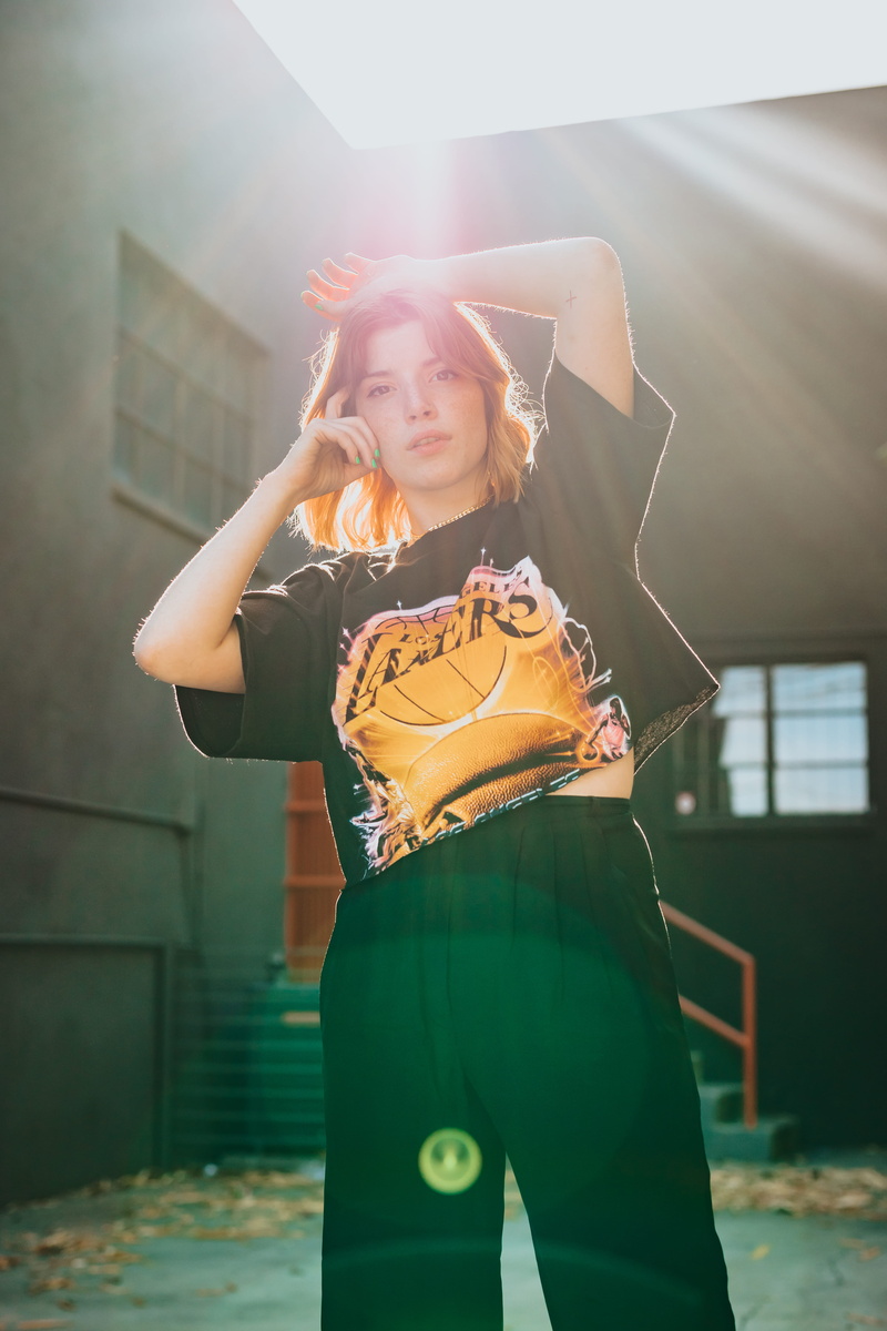 hairstyle, blonde, person, staring, young adult, los angeles laker, caucasian, sunray, built structure, leisure activity, girl, building exterior, 5K