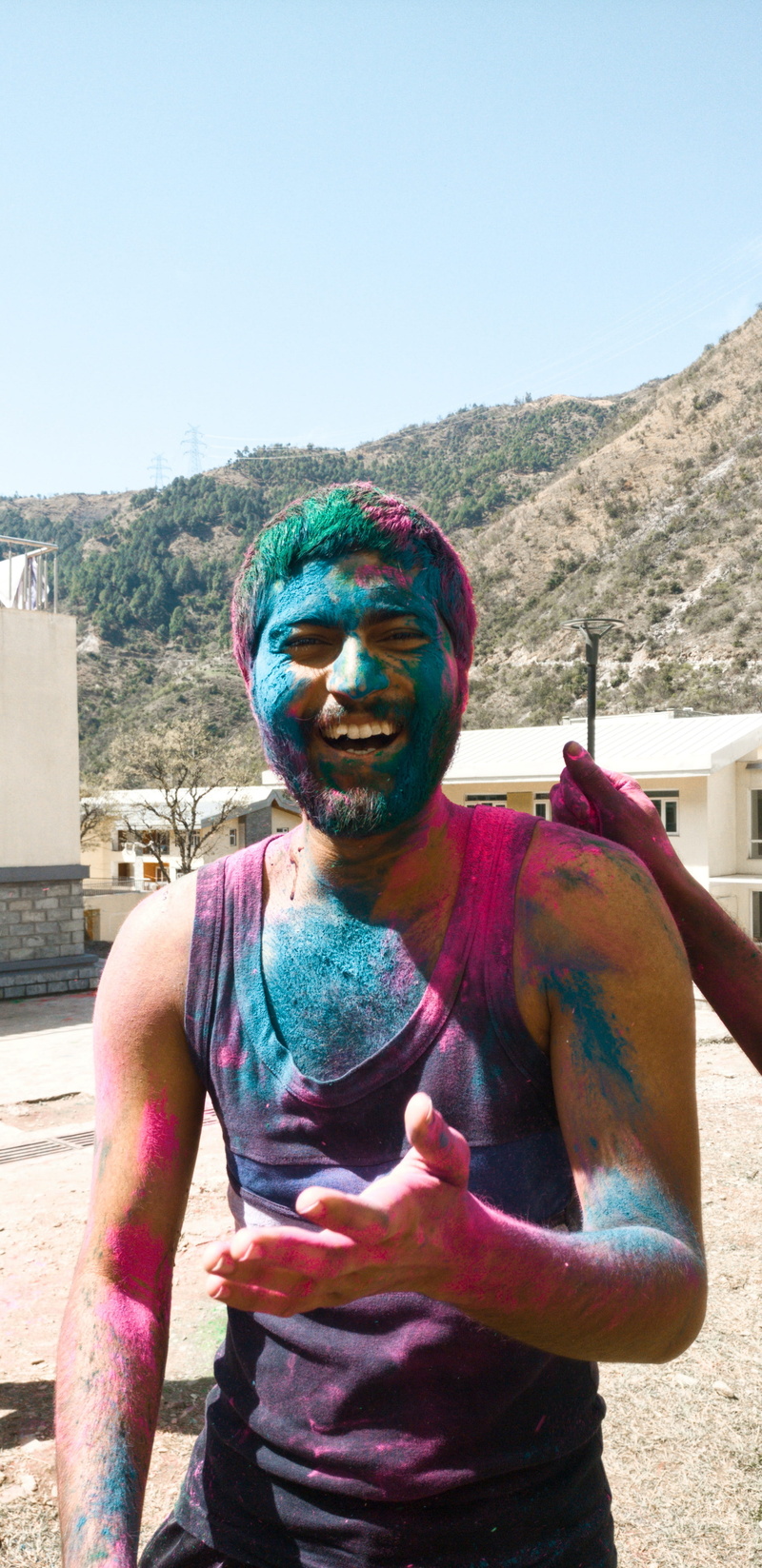 young men, portrait, kamand, colors, casual clothing, 4K, waist up, young adult, front view, leisure activity, sky, powder paint, multi colored, college