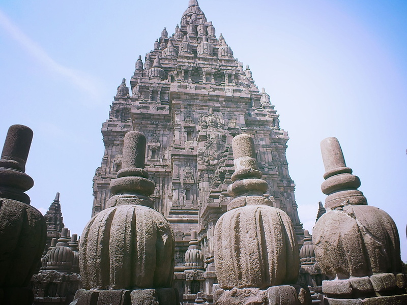 low angle view, day, building exterior, travel destinations, belief, no people, prambanan temple, history, ancient civilization, built structure, architecture