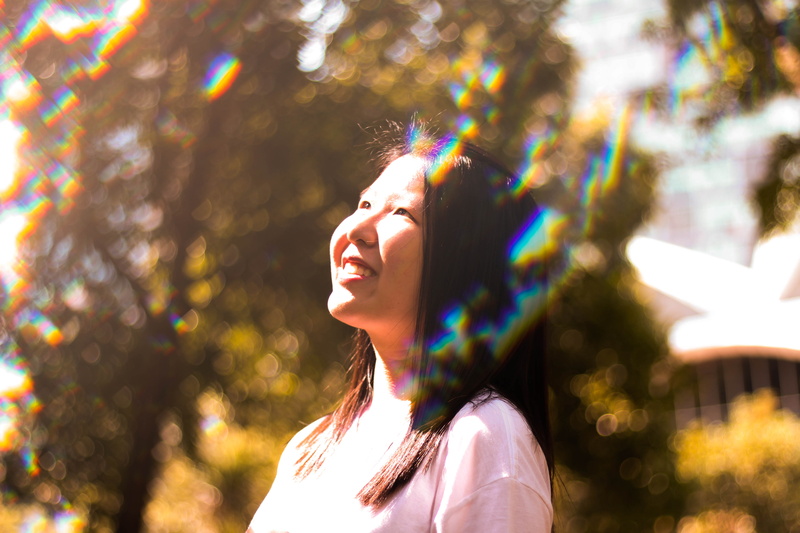 festival, looking away, aesthetic, klcc, sunlight, tree, adult, looking, side view, smiling, rainbow, costume, beautiful woman, lighting, 5K, teenager