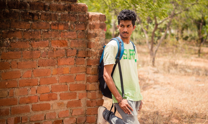 forest, leisure activity, red, front view, backpacker, real people, young men, three quarter length, green, brick, 5K, holding, lifestyles, tirunelveli