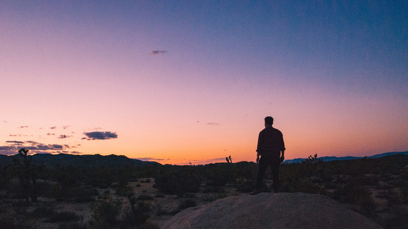 scenics - nature, land, copy space, mountain range, travel, sky, outdoors, real people, landscape, nature, tranquility, looking at view, standing, roadtrip