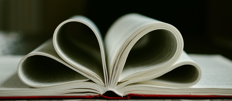 opened, page, read, close, black background, no people, literature, photography, close-up, folded, reading, holy scripture, heart shape, education, indoors