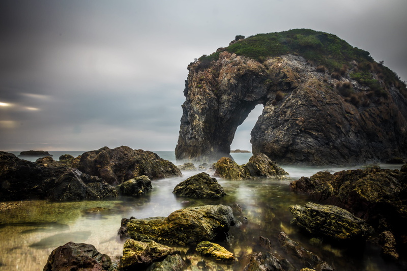 beauty in nature, longexposure, ocean, tranquility, eroded, tranquil scene, flowing, solid, rock - object, long exposure, motion, day, natural arch, outdoors