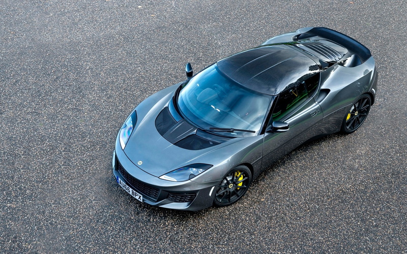 high angle view, evora, car, sports race, motor vehicle, speed, motorsport, competition, sport, transportation, headlight, day, auto, mode of transportation