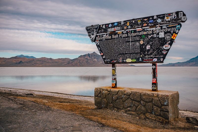 water, day, speedway, united states, nature, mountain, mountain range, beauty in nature, sign, salt flats, bonneville, cloud - sky, no people, tranquil scene
