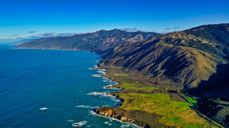 nature, beauty in nature, formation, tranquil scene, environment, sea, promontory, idyllic, shoreline, volcano, land, high angle view, tranquility, united states