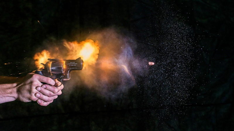warning sign, bullet, real people, hand, nature, holding, gun, night, human hand, magnum, smoke - physical structure, fire, photography, aggression, gunshot