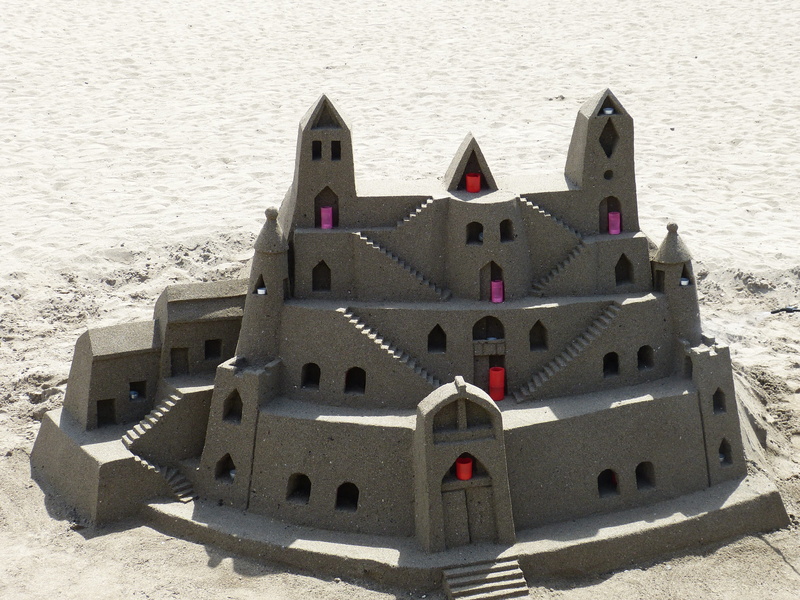 no people, sunlight, castle, outdoors, the past, close-up, water, fortress, sand, beach, Sand Sculpture, nautical vessel, shadow, military, land, architecture