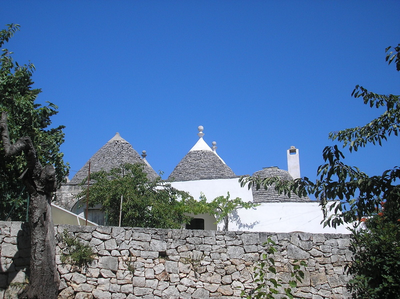 building, no people, sunlight, built structure, Trulli, building exterior, religion, spirituality, plant, day, Puglia, belief, history, outdoors, walls