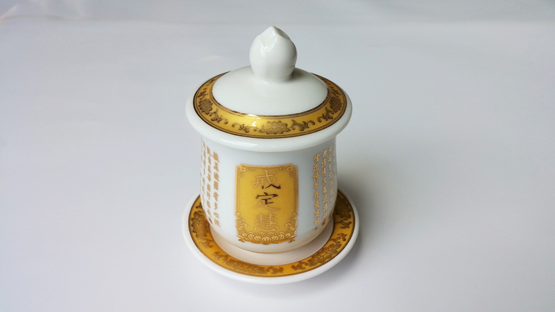 white color, close-up, focus on foreground, offering, golden, metal, food, single object, wisdom, altar, still life, religious, indoors, precept, wellbeing