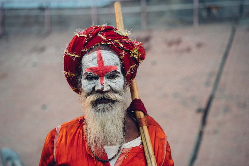 red, social issues, wearing, ganges, facial hair, beard, men, holy, tradition, brown, adult, hindu, india, top, holding, people, culture, religion, senior men