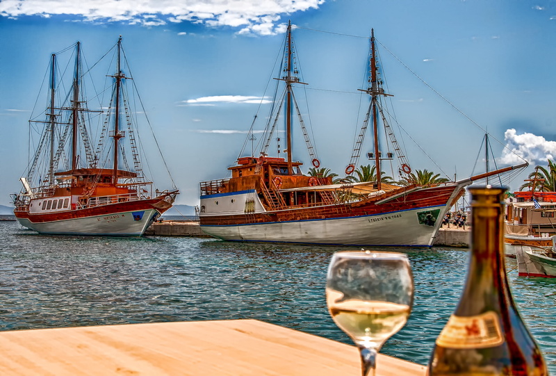sailing boat, cloud - sky, moored, anchor, transport, water, break, sailing vessel, pole, vacations, mode of transportation, no people, maritime, sun, idyllic
