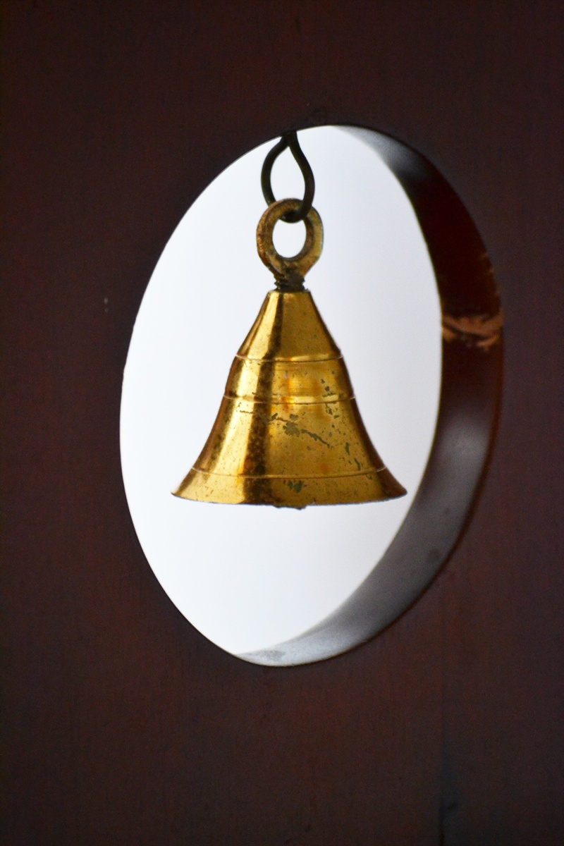 single object, no people, mawanella, chain, illuminated, wall - building feature, shape, ornaments, wood - material, indoors, gold colored, design, ceiling